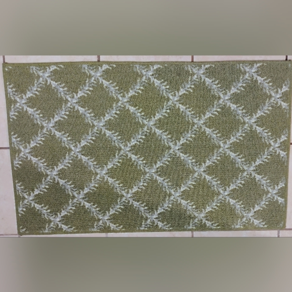 Green and White Patterned Rug